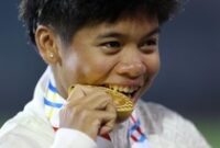 1765602276813-dina-aulia-atletik-lari-gawang-sea-games-2025-sea-games-thailand-medali-emas-sea-games-2025-1765591609790_43